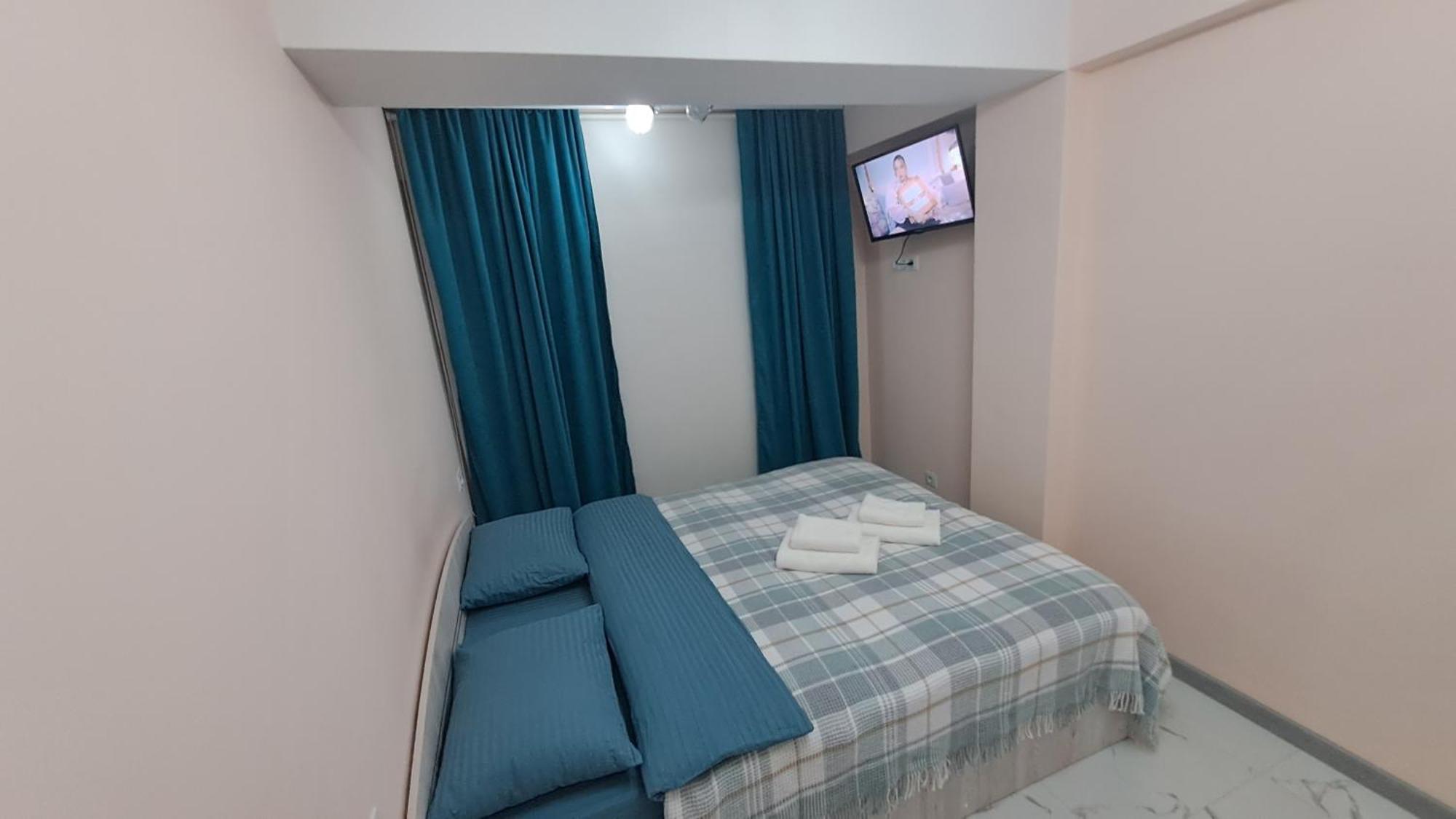 Аэропорт Апартаменты 24&24 Chişinău Habitación foto